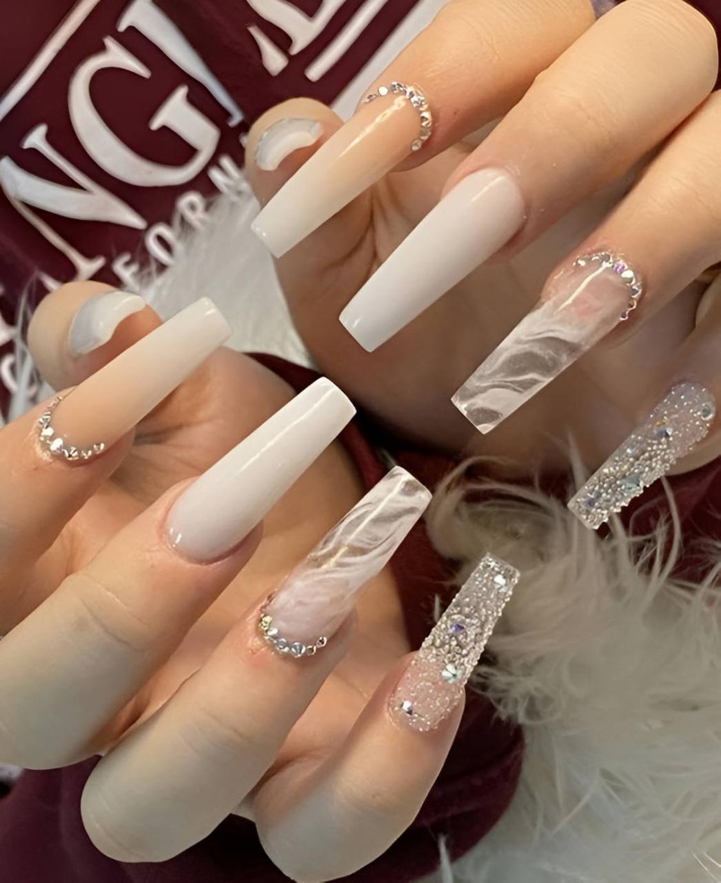 Discover 30 glamorous white nail designs that will make you the center of attention.