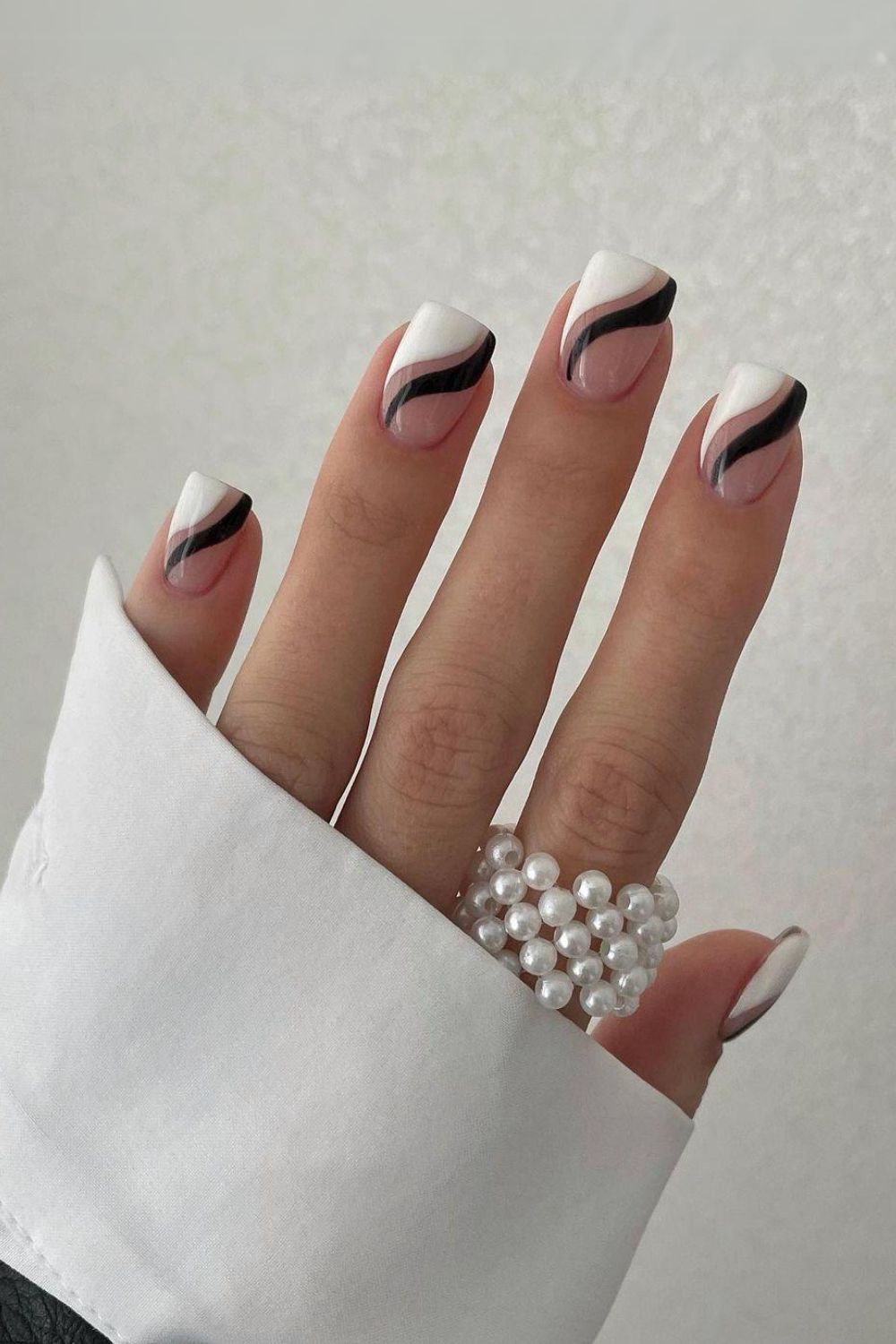 Black and white nails with negative space design