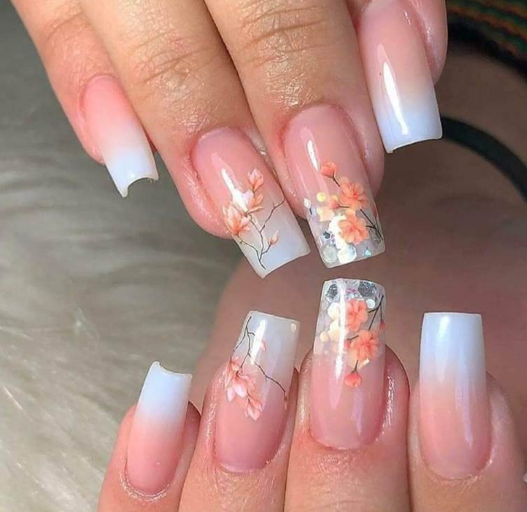 88 Decorated Nails Salmon pink at the base pearly white at the tips with drawings of pink cherry tree twigs